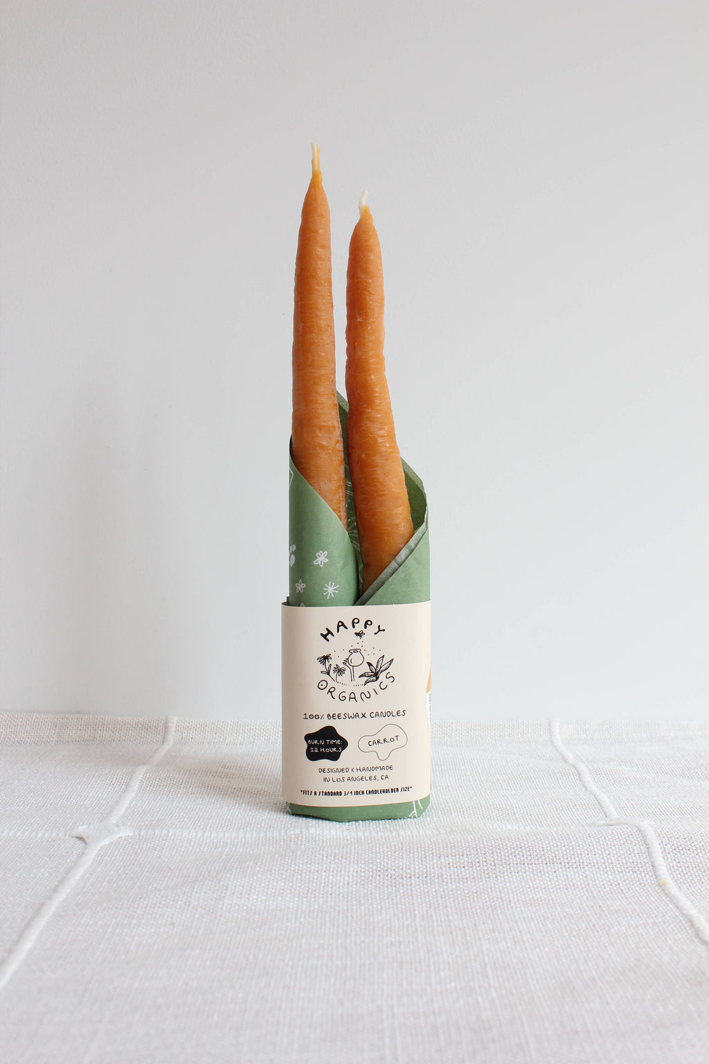 Carrot Beeswax Candles Taper Pair — styled
