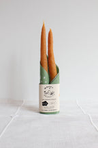 Carrot Beeswax Candles Taper Pair — styled