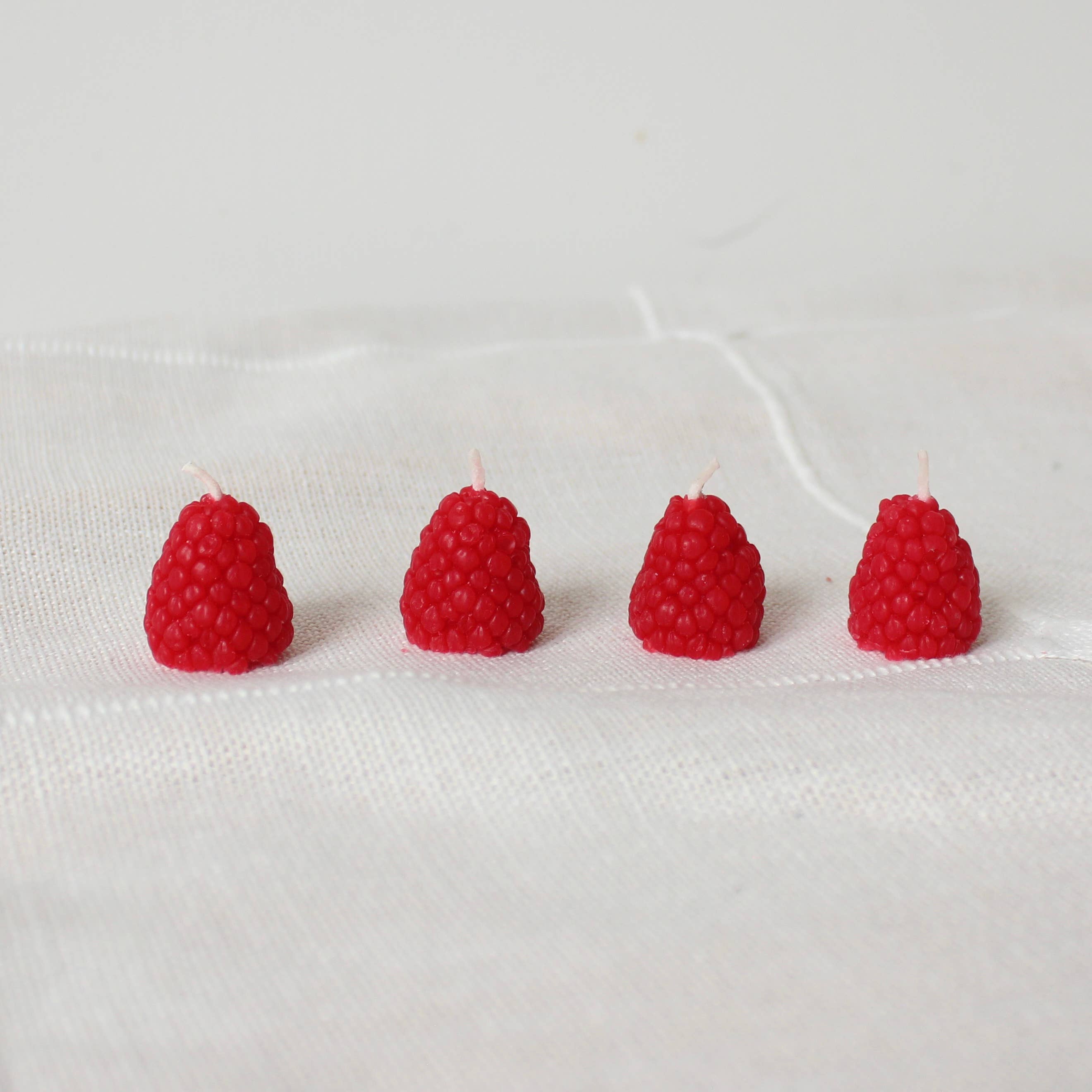 Raspberry Beeswax Birthday Candles - 4 count — styled