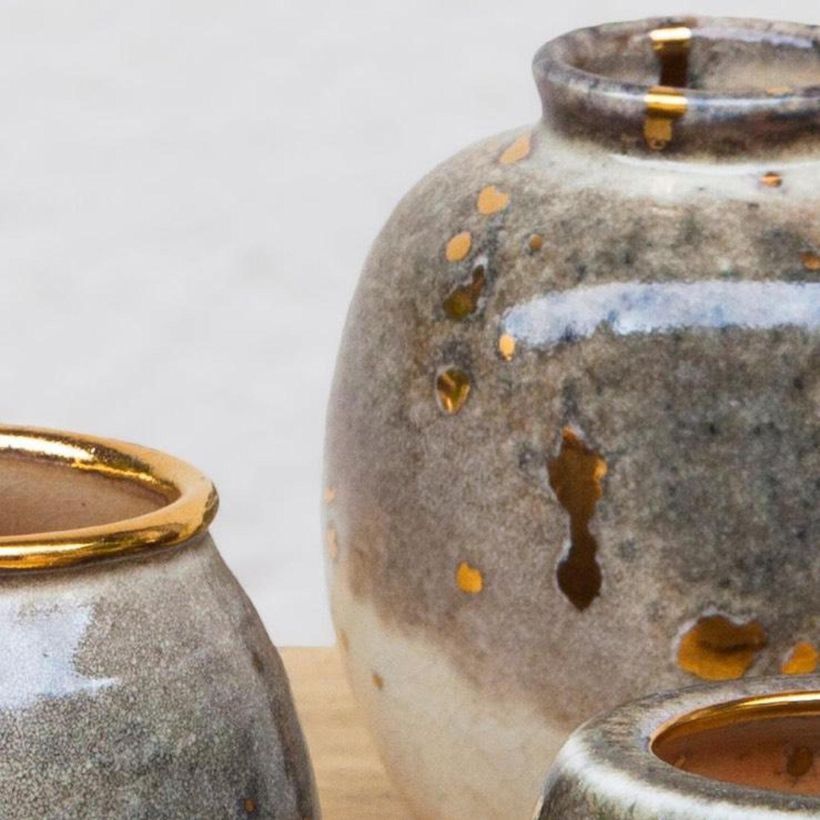 Close-up detail of 24 carat gold flecks on the Shino glaze of a Stardust vase
